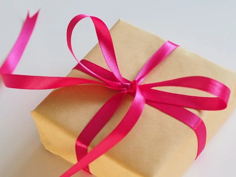 Red and gold wrapped premium gifts showcasing business gifting etiquette hong kong