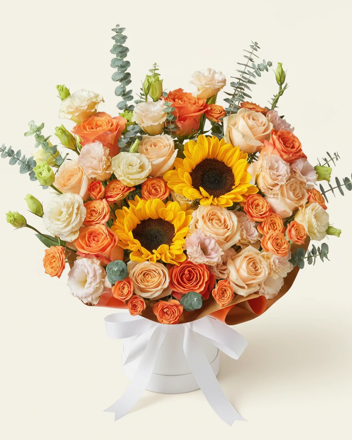 Warm Sun Tribute Flower Bucket — Sunflowers — 2 stems, Orange roses — 5 stems, Champagne roses — 7 stems, Orange multi-head roses — 5 stems (6–8 heads/stem), Champagne eustoma — 9 stems (3+ heads/stem), Eucalyptus foliage — 20 stems