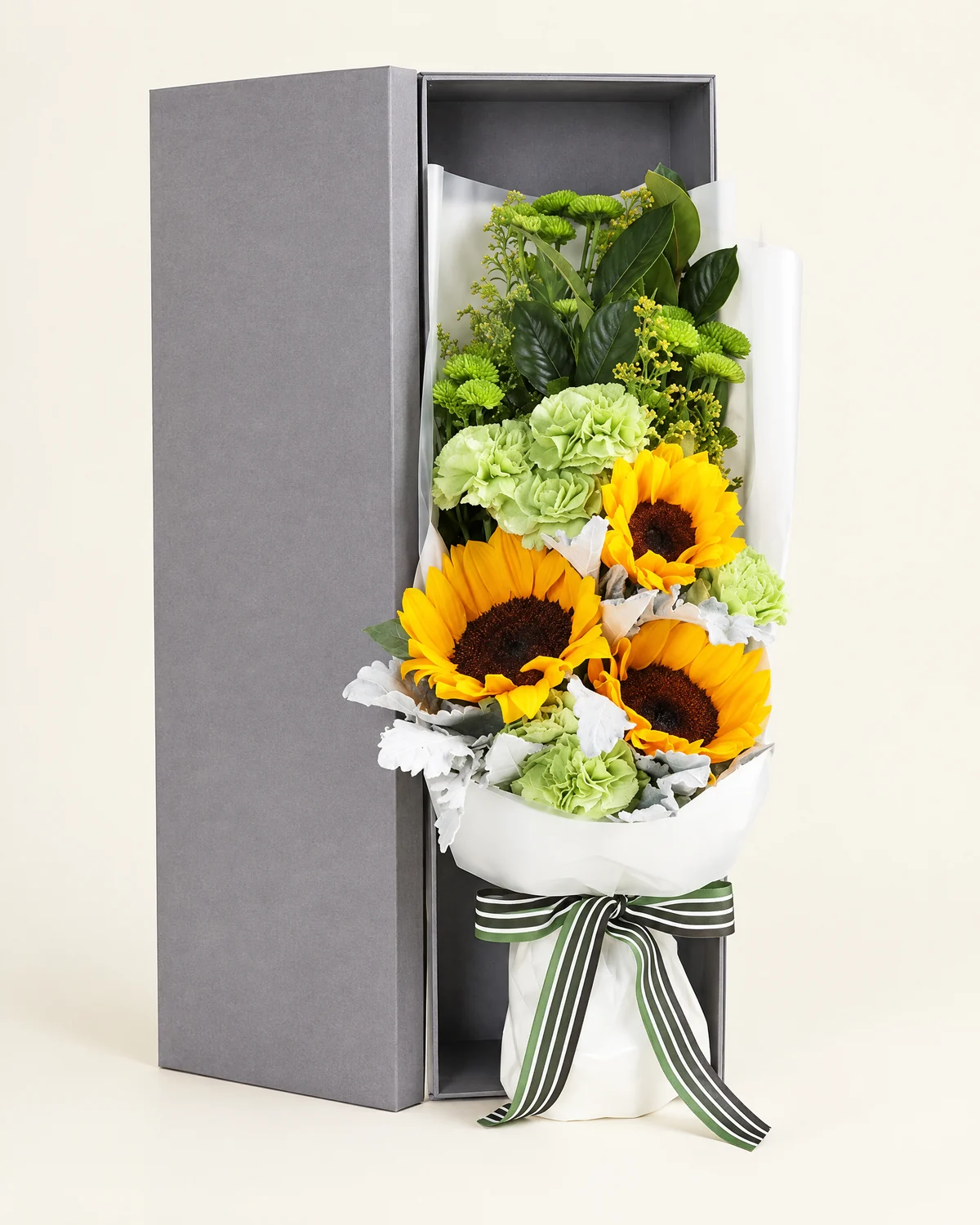 Sunflower Summer Warmth Bouquet — Sunflowers, 3 stems, Green carnations, 6 stems, Small green chrysanthemums, 3 stems, Gardenia foliage, 2 stems, Yellow euryops, 4 stems, Dusty miller (silver foliage), 5 stems