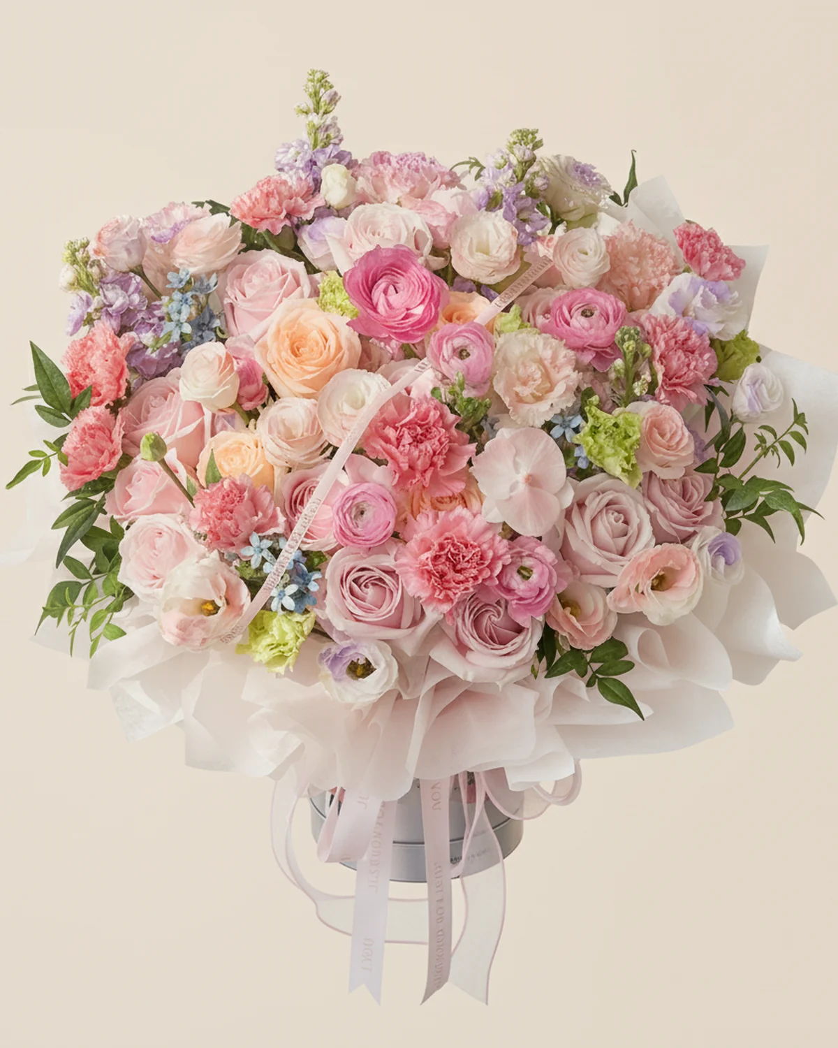 Dad’s Sweet Garden Bouquet — Pink roses, 12 stems, Champagne roses, 4 stems, White moth orchid, 1 bloom, Pink carnations, 8 stems, White lisianthus, 6 stems (multi-head, 3+ heads per stem; sprayed pink and purple), Blue star flowers, 4 stems, Purple stock flowers, 4 stems, Pink peonies, 7 stems, Nine-star foliage, 7 sprigs