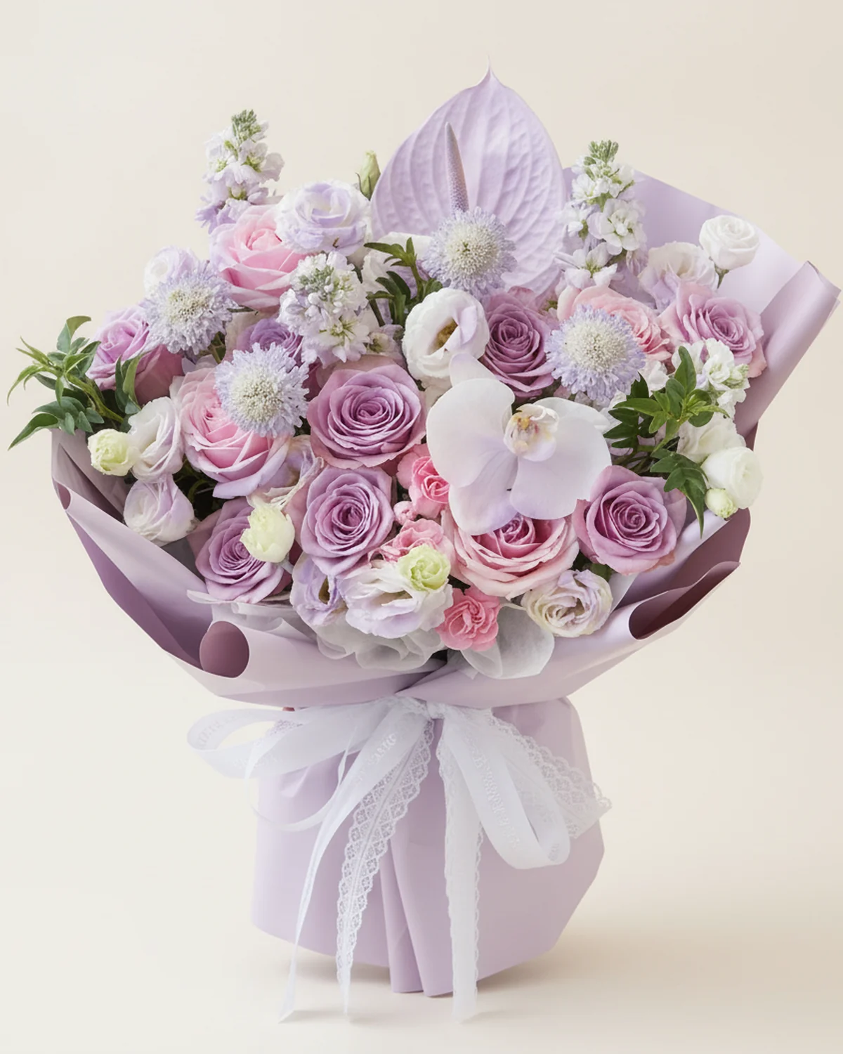 Sincere Purple Bouquet for Dad — 4 pink "Snow Mountain" roses (or lychee roses), 8 purple roses, Purple scabiosa, 4 stems, 4 purple stock flowers, Anthuriums, 1 stems, 1 white phalaenopsis orchid (sprayed purple), 3 stems of nine-star foliage, 7 white eustoma stems (3+ heads each), 1 pink multi-headed carnation stem