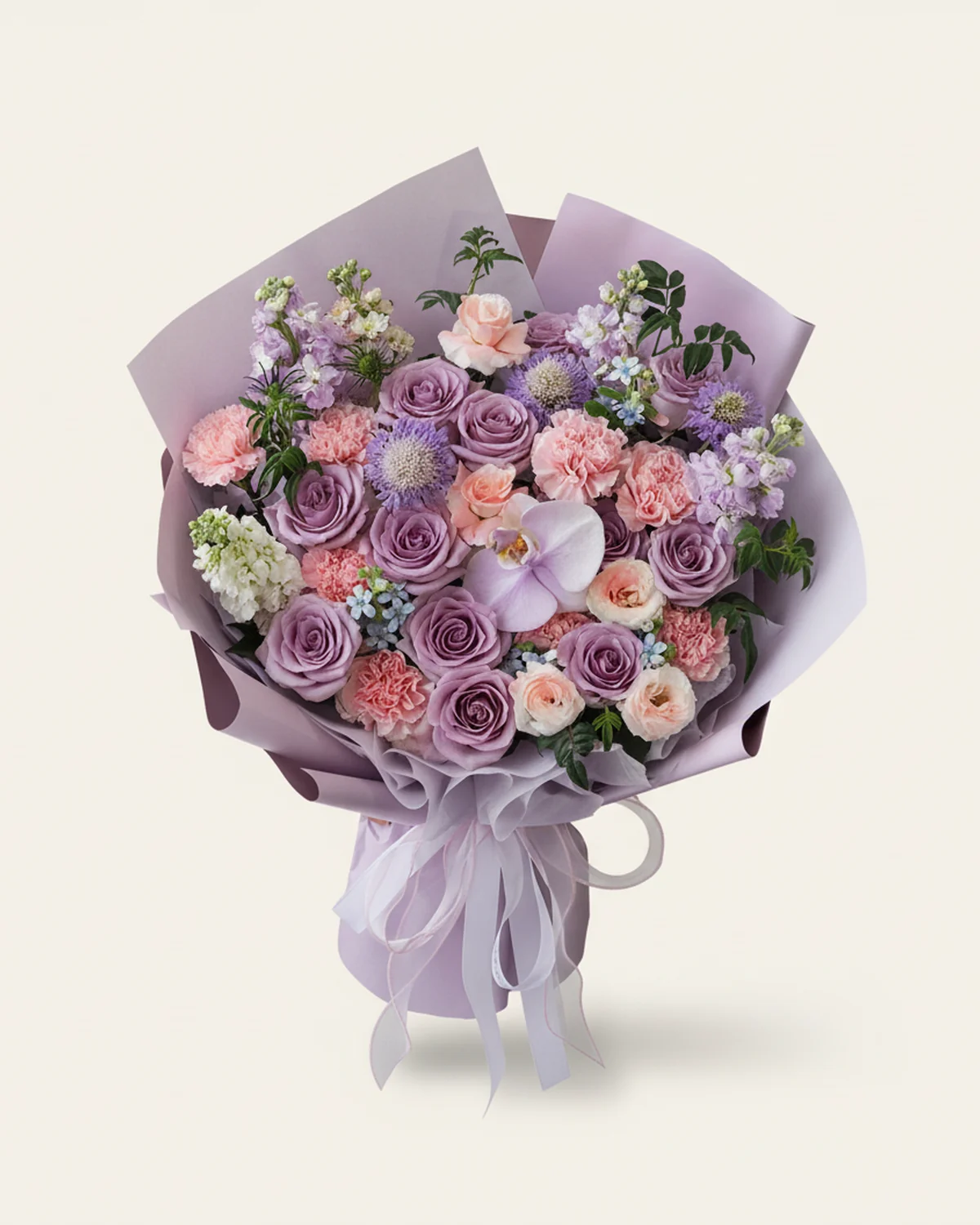 Violet Ocean Tribute for Dad — Purple roses 'Ocean Song' 12 stems, Light pink carnations 8 stems, White moth orchid 1 bloom (sprayed light purple), Purple stock flowers 3 stems, White stock flowers 2 stems, Purple scabiosa, 3 stems, White lisianthus (sprayed pink) 2 stems (4+ heads/stem), Nine-star foliage, 5 stems, Blue starflower 3 stems