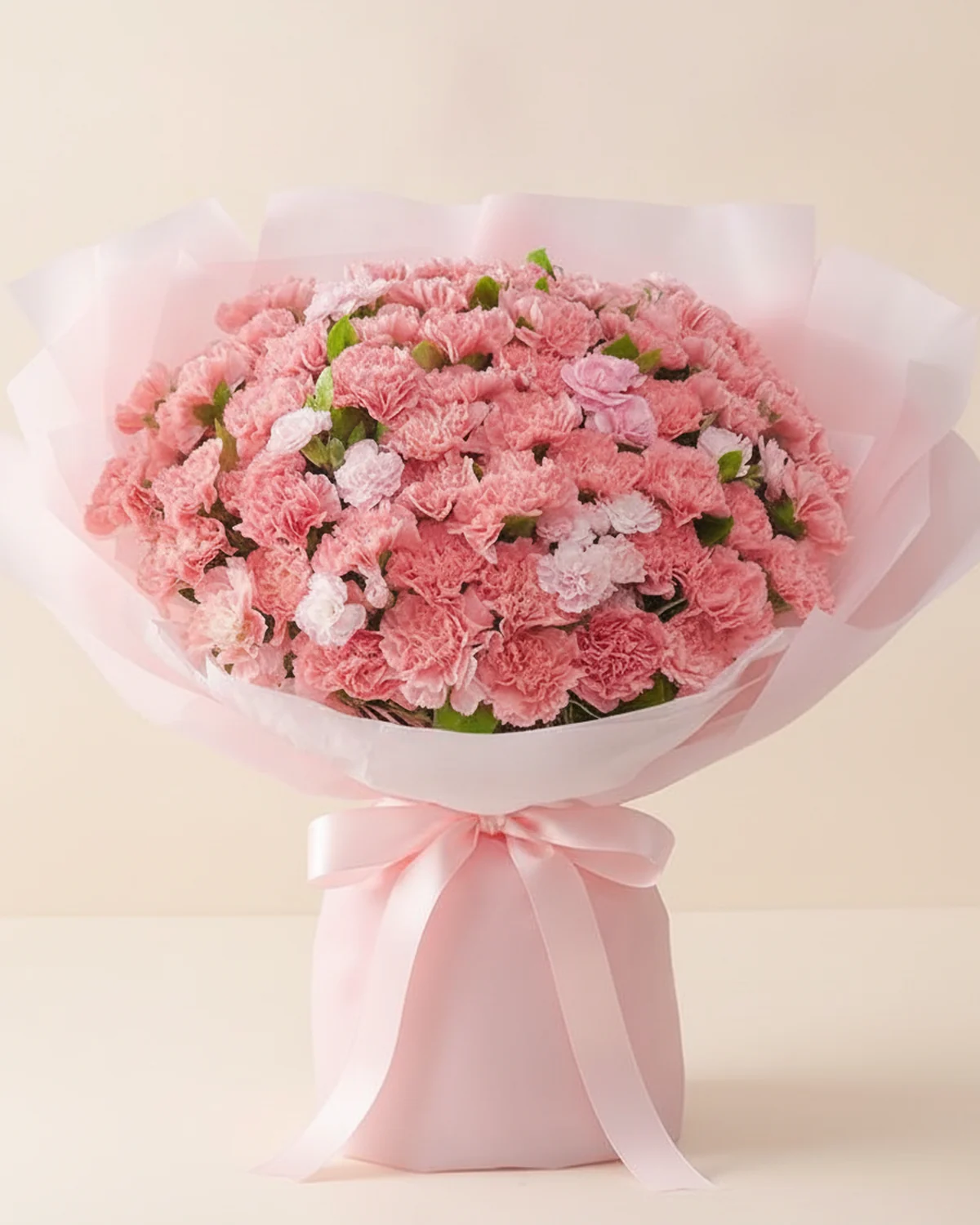 Pink Carnation Abundance Bouquet — Pink carnations, 66 stems, Pink spray carnations, 6 stems, Gardenia foliage, 10 stems