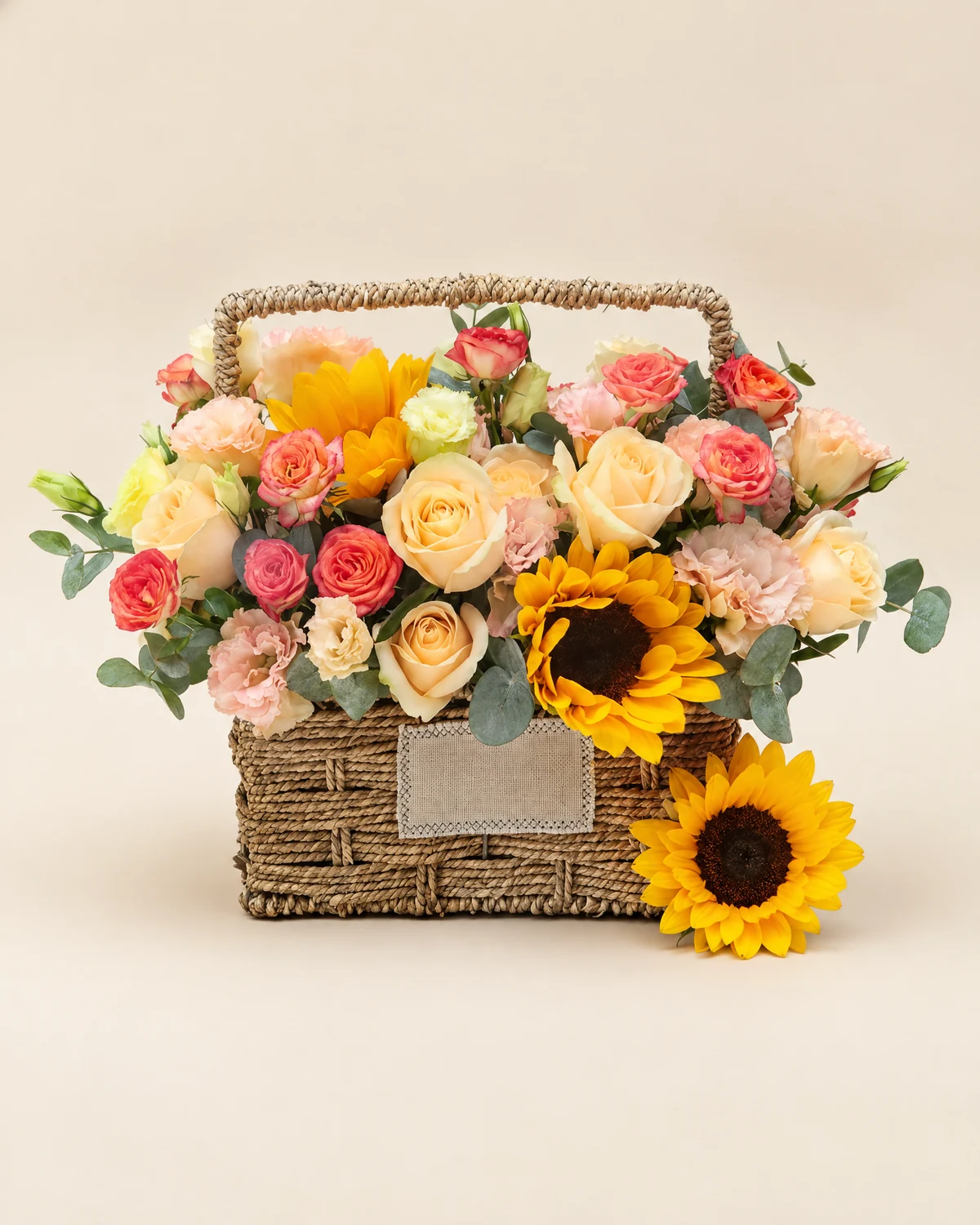 Sunshine Tribute Basket for Dad — 11 champagne roses, 2 sunflowers, 3 champagne lisianthus (3+ heads per stem), 2 orange multi-head roses (6-8 heads per stem), 5 eucalyptus stems