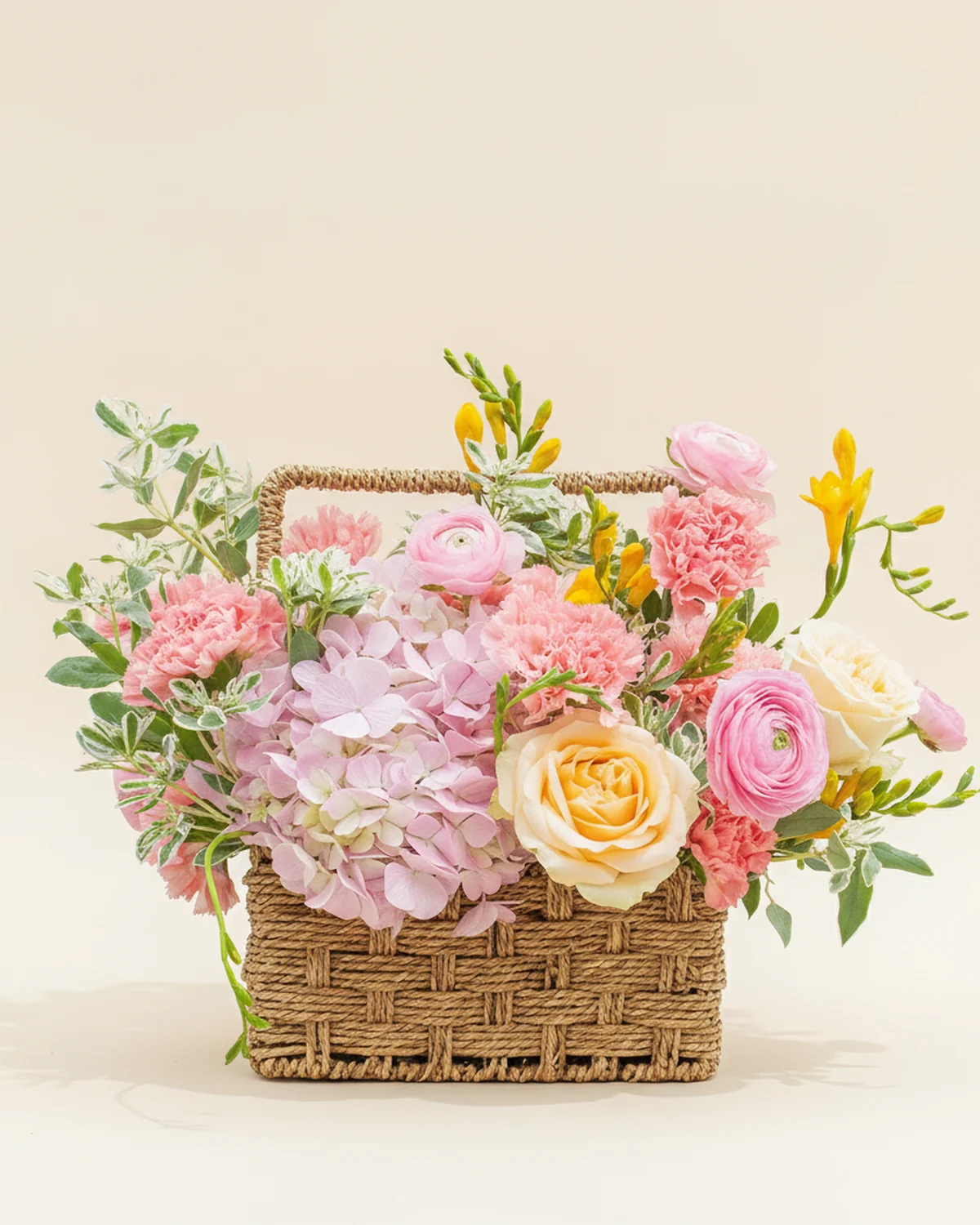 A Tender Gift for Dad — 13 stems pink carnations, 1 stem pink hydrangea, 9 stems champagne roses, Pink ranunculus, 8 stems, 10 stems yellow freesia, 10 stems white leafy filler