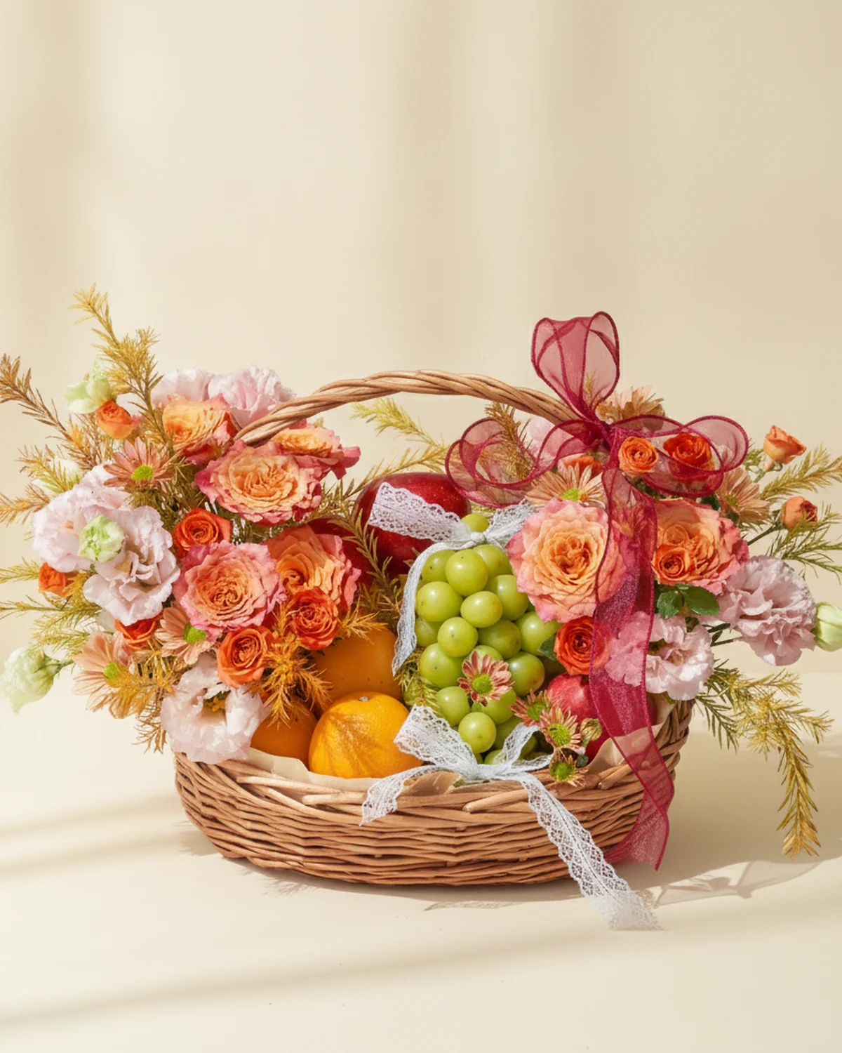 Dad's Warm Fruit & Flowers Basket — 7 stems orange roses 'Huo Ling Niao' (or 'Huihuang'/'King's Day' orange roses), 5 stems pink lisianthus (4 heads per stem), 4 stems orange 'Barbie' (3+ heads), 4 stems orange spray chrysanthemums (3+ heads), 15 stems golden solidago, Fruits: 4 apples; 1.5 jin Sunshine Rose grapes; 4 imported oranges (fruits subject to local availability)