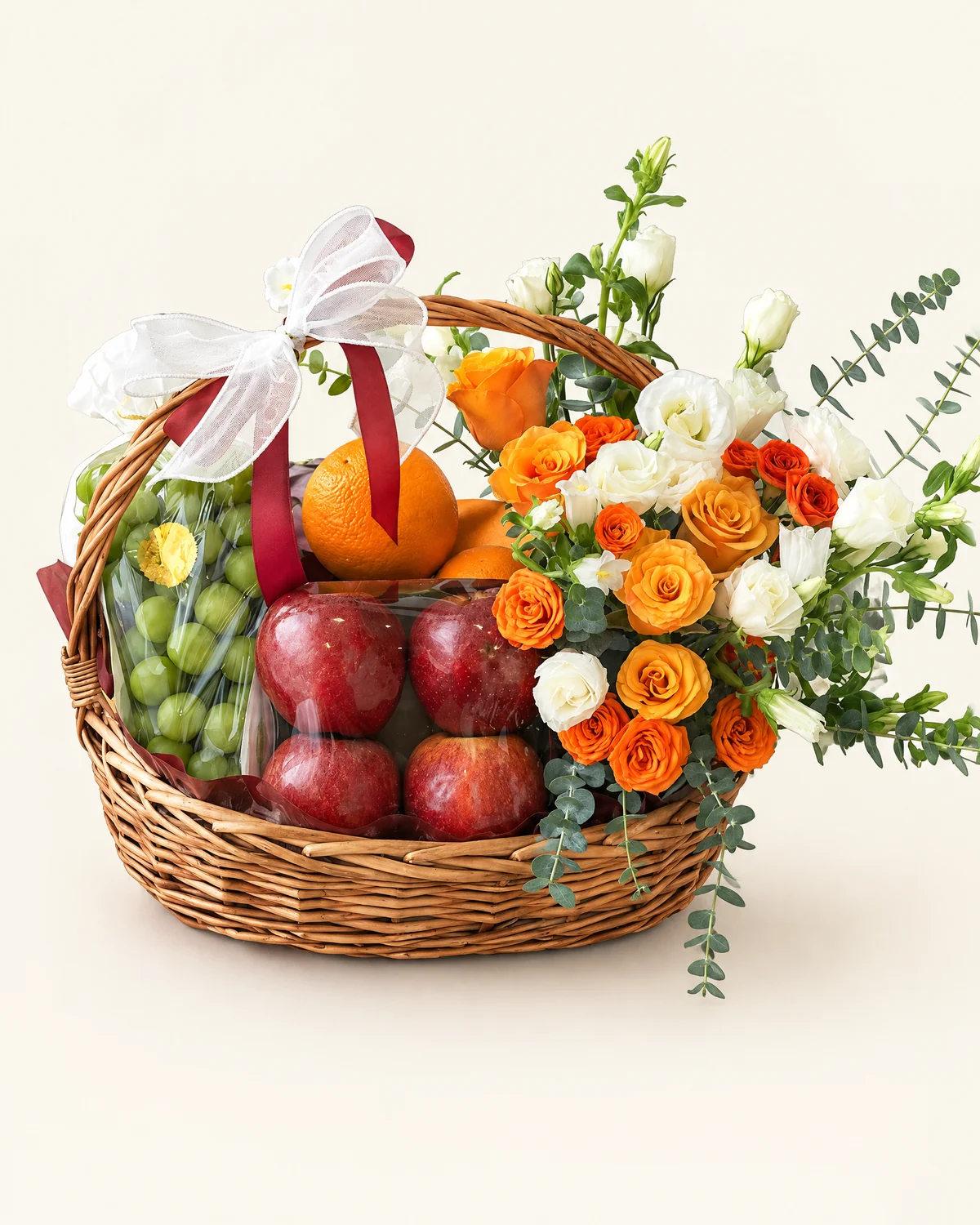 Sunlit Fruit & Bloom Basket for Dad — Orange brilliance roses 5 stems, Orange multi-head bubble roses 3 stems (6+ heads per stem), White campanula 4 stems, Multi-head white lisianthus 3 stems (3+ heads per stem), Eucalyptus foliage (quantity as arranged), Imported oranges 3 pcs, Imported apples 4 pcs, Sunshine Rose grapes 1.5 jin, Dragon fruit 1 pc