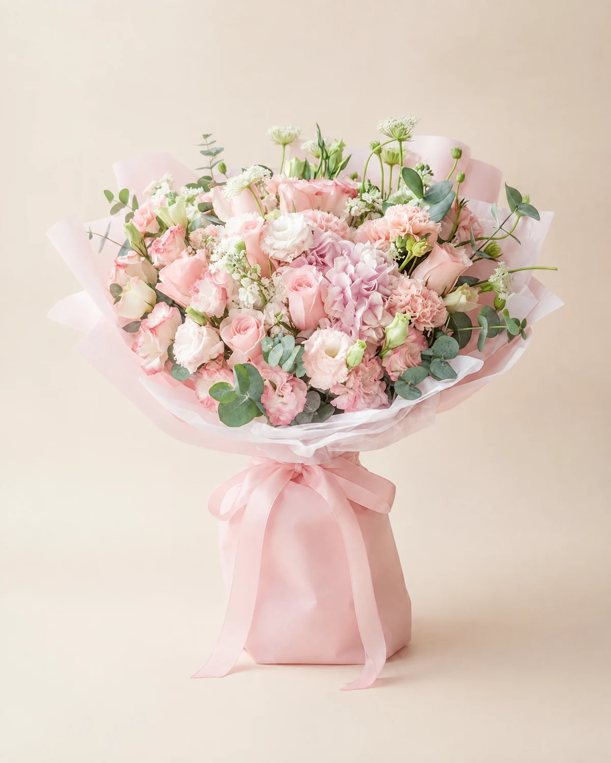 Soft Pink Hydrangea Garden Bouquet — Pink carnations, 11 stems, Pink Jia Ren roses, 5 stems, White lisianthus with pink edges, 5 stems, Pink hydrangea, 1 stem, White stock, 5 stems, White lace flower, 3 stems, Eucalyptus, 5 stems
