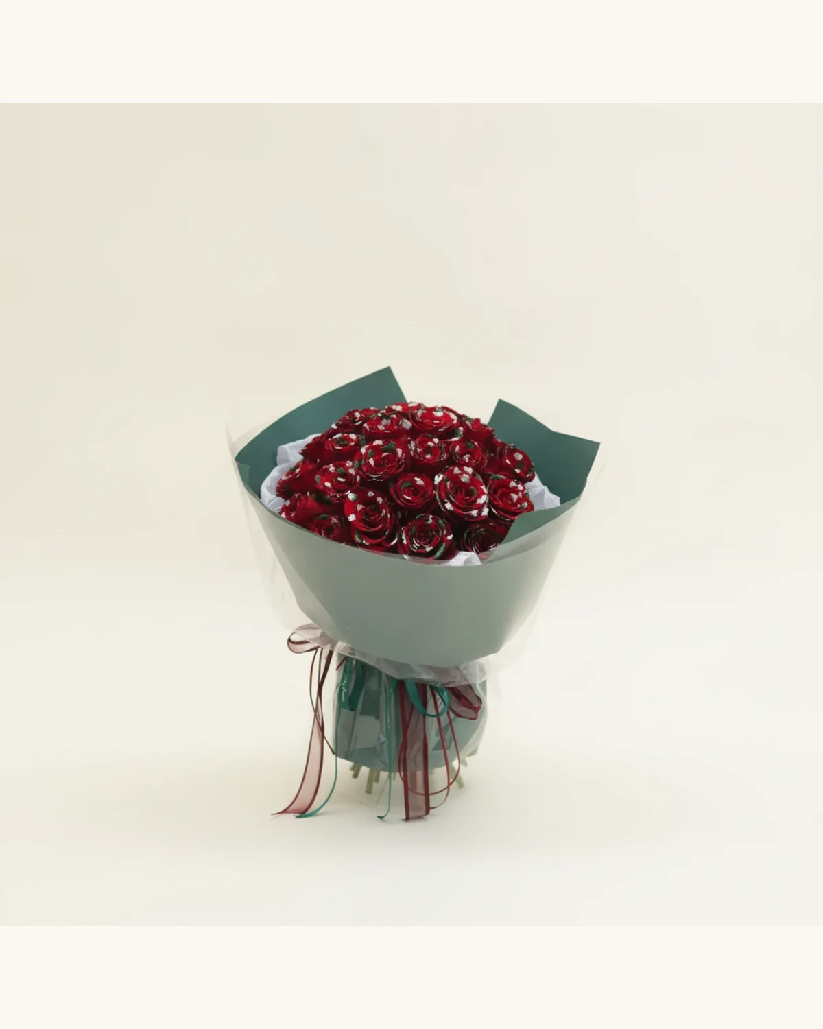 Christmas Snowflake Painted Red Rose Bouquet — 27 Hand-painted Snowflake Red Roses, Dark Green Wrapping Paper, Clear Cellophane Wrap, Burgundy and Green Ribbons