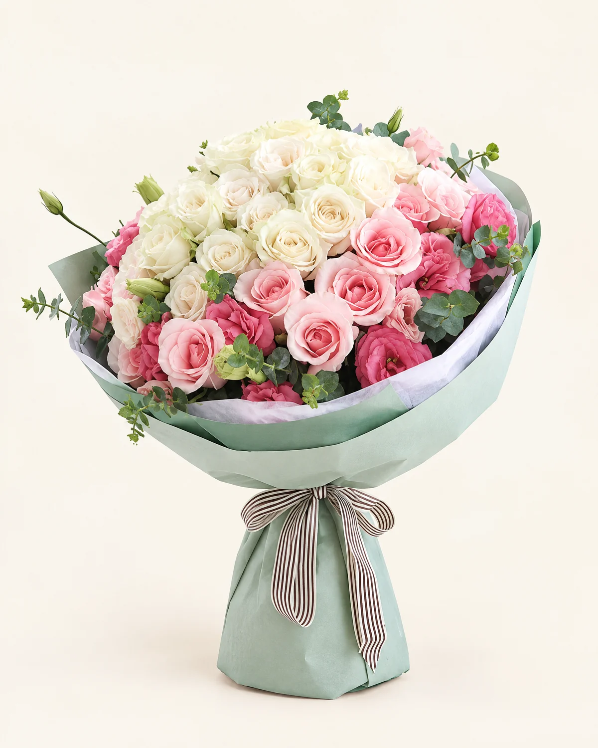 Whispered Sweetness — White roses (Tanike) — 22 stems, Pink roses — 14 stems (Pink Lady or Diana), Pink eustoma (lisianthus) — 5 stems (multi-headed, 3+ heads per stem), Eucalyptus — 5 stems