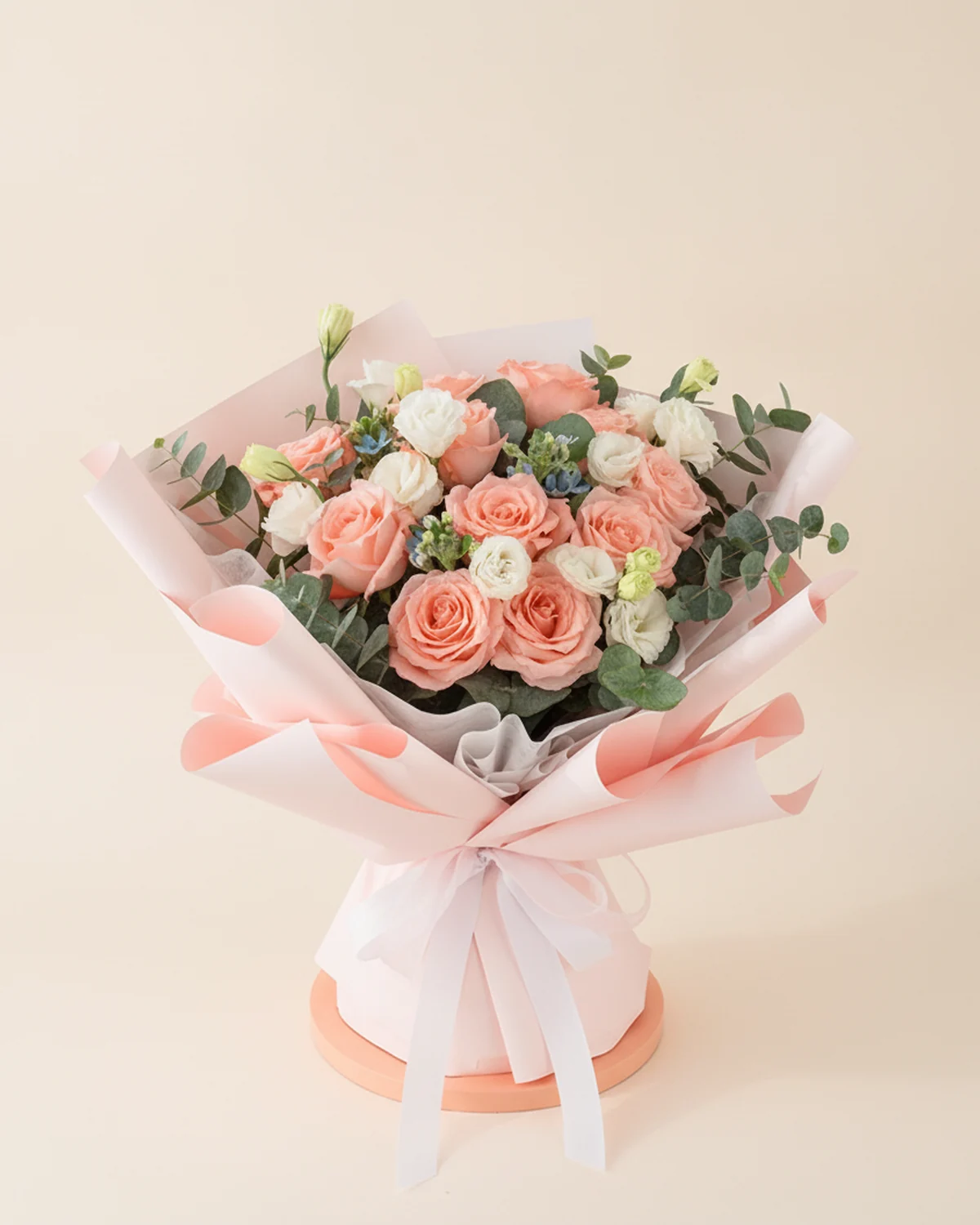 Pink Promise — Diana pink roses — 11 stems, White lisianthus (multi-headed) — 3 stems (3+ heads per stem), Blue star flower — 2 stems, Eucalyptus — several stems